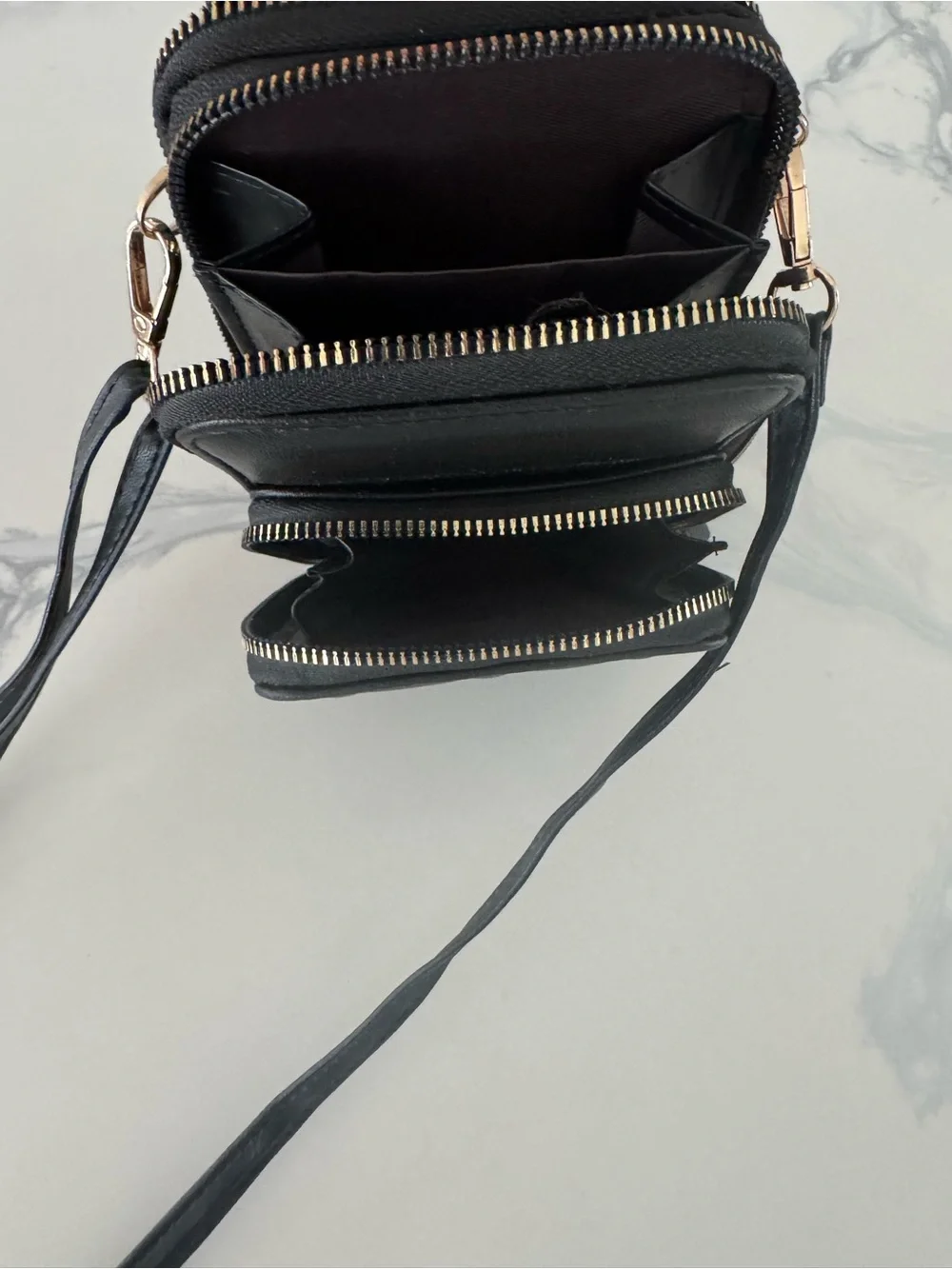 Elegant Black Crossbody Bag with Gold Accents - Minimalist Carry